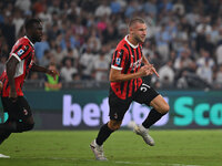 Strahinja Pavlovic of A.C. Milan celebrates after scoring the goal of 0-1 during the 3rd day of the Serie A Championship between S.S. Lazio...