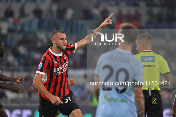 Strahinja Pavlovic of A.C. Milan celebrates after scoring the goal of 0-1 during the 3rd day of the Serie A Championship between S.S. Lazio...