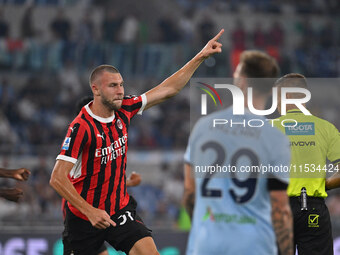 Strahinja Pavlovic of A.C. Milan celebrates after scoring the goal of 0-1 during the 3rd day of the Serie A Championship between S.S. Lazio...