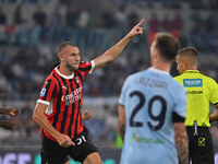 Strahinja Pavlovic of A.C. Milan celebrates after scoring the goal of 0-1 during the 3rd day of the Serie A Championship between S.S. Lazio...