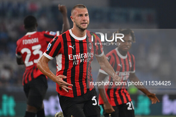 Strahinja Pavlovic of A.C. Milan celebrates after scoring the goal of 0-1 during the 3rd day of the Serie A Championship between S.S. Lazio...