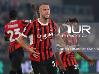 Strahinja Pavlovic of A.C. Milan celebrates after scoring the goal of 0-1 during the 3rd day of the Serie A Championship between S.S. Lazio...