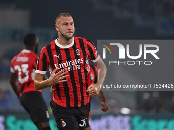 Strahinja Pavlovic of A.C. Milan celebrates after scoring the goal of 0-1 during the 3rd day of the Serie A Championship between S.S. Lazio...