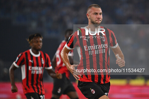 Strahinja Pavlovic of A.C. Milan celebrates after scoring the goal of 0-1 during the 3rd day of the Serie A Championship between S.S. Lazio...