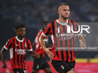 Strahinja Pavlovic of A.C. Milan celebrates after scoring the goal of 0-1 during the 3rd day of the Serie A Championship between S.S. Lazio...