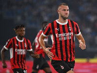 Strahinja Pavlovic of A.C. Milan celebrates after scoring the goal of 0-1 during the 3rd day of the Serie A Championship between S.S. Lazio...