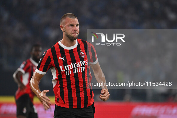 Strahinja Pavlovic of A.C. Milan celebrates after scoring the goal of 0-1 during the 3rd day of the Serie A Championship between S.S. Lazio...