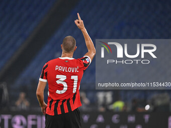 Strahinja Pavlovic of A.C. Milan celebrates after scoring the goal of 0-1 during the 3rd day of the Serie A Championship between S.S. Lazio...