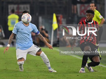 Mattia Zaccagni of S.S. Lazio and Emerson of A.C. Milan during the 3rd day of the Serie A Championship between S.S. Lazio and A.C. Milan at...