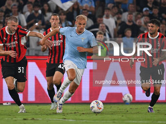 Strahinja Pavlovic of A.C. Milan, Gustav Isaksen of S.S. Lazio, and Christian Pulisic of A.C. Milan during the 3rd day of the Serie A Champi...