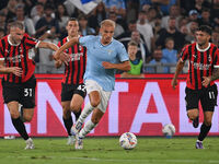 Strahinja Pavlovic of A.C. Milan, Gustav Isaksen of S.S. Lazio, and Christian Pulisic of A.C. Milan during the 3rd day of the Serie A Champi...