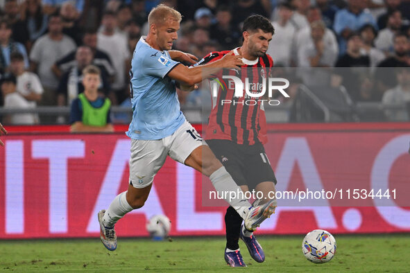 Gustav Isaksen of S.S. Lazio and Christian Pulisic of A.C. Milan during the 3rd day of the Serie A Championship between S.S. Lazio and A.C....