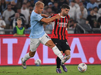 Gustav Isaksen of S.S. Lazio and Christian Pulisic of A.C. Milan during the 3rd day of the Serie A Championship between S.S. Lazio and A.C....