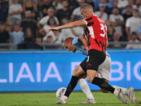 Strahinja Pavlovic of A.C. Milan and Gustav Isaksen of S.S. Lazio during the 3rd day of the Serie A Championship between S.S. Lazio and A.C....