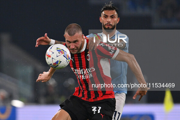 Strahinja Pavlovic of A.C. Milan and Valentin Castellanos of S.S. Lazio during the 3rd day of the Serie A Championship between S.S. Lazio an...