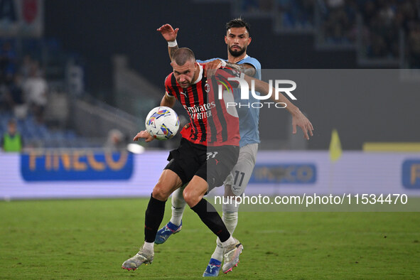 Strahinja Pavlovic of A.C. Milan and Valentin Castellanos of S.S. Lazio during the 3rd day of the Serie A Championship between S.S. Lazio an...