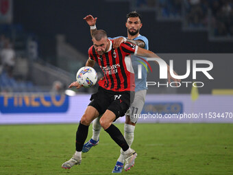 Strahinja Pavlovic of A.C. Milan and Valentin Castellanos of S.S. Lazio during the 3rd day of the Serie A Championship between S.S. Lazio an...