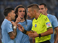 Mattia Zaccagni of S.S. Lazio and Referee Davide Massa during the 3rd day of the Serie A Championship between S.S. Lazio and A.C. Milan at t...