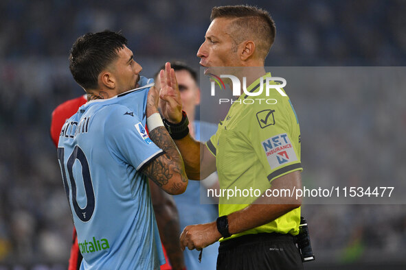 Mattia Zaccagni of S.S. Lazio and Referee Davide Massa during the 3rd day of the Serie A Championship between S.S. Lazio and A.C. Milan at t...