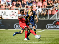 FC Utrecht player Noah Ohio and FC Twente player Mathias Kjolo during the match between Utrecht and Twente at Stadium Galgenwaard for the Du...