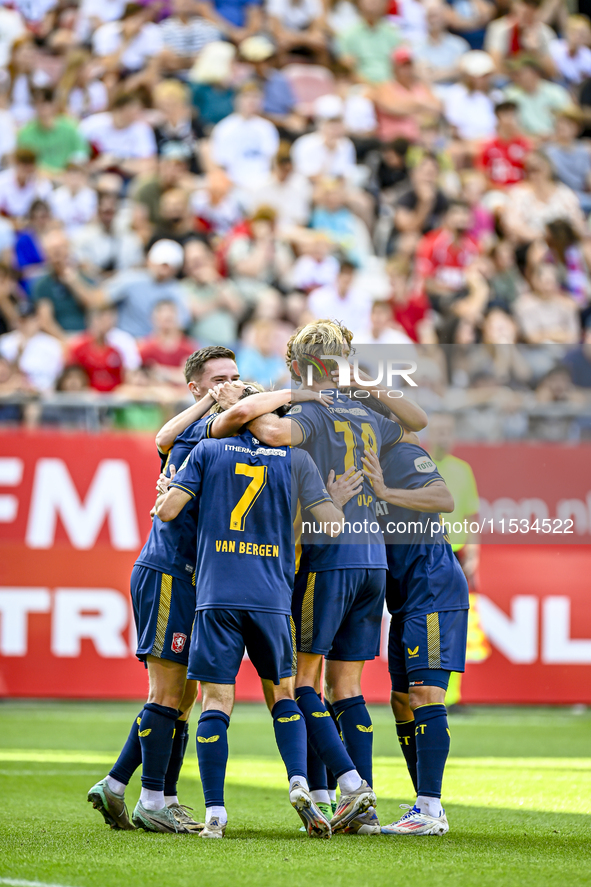 Players of FC Twente celebrate the goal of FC Twente player Sam Lammers, making the score 0-1, during the match between Utrecht and Twente a...