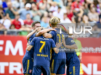 Players of FC Twente celebrate the goal of FC Twente player Sam Lammers, making the score 0-1, during the match between Utrecht and Twente a...