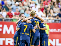 Players of FC Twente celebrate the goal of FC Twente player Sam Lammers, making the score 0-1, during the match between Utrecht and Twente a...