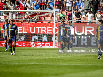 Players of FC Twente are disappointed after the goal of FC Utrecht player Jens Toornstra, making the score 1-1, during the match between Utr...