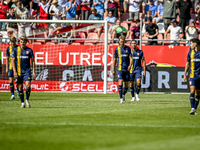 Players of FC Twente are disappointed after the goal of FC Utrecht player Jens Toornstra, making the score 1-1, during the match between Utr...