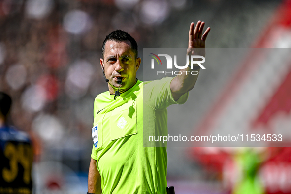 Referee Dennis Higler officiates the match between Utrecht and Twente at Stadium Galgenwaard for the Dutch Eredivisie 4th round season 2024-...