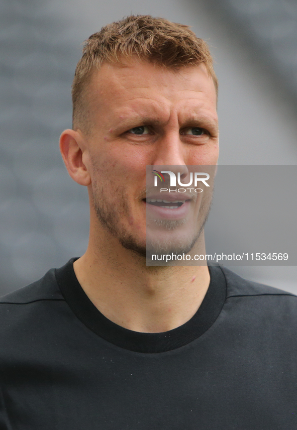 Newcastle United's Dan Burn during the Premier League match between Newcastle United and Tottenham Hotspur at St. James's Park in Newcastle,...