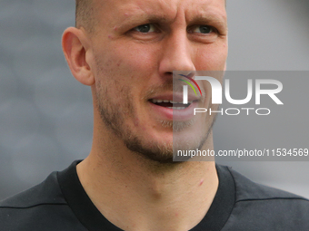 Newcastle United's Dan Burn during the Premier League match between Newcastle United and Tottenham Hotspur at St. James's Park in Newcastle,...