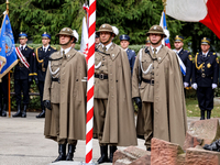 Military servicemen stand by the monument to the unknown soldier during the a ceremony commemorating 85. anniversary of an the outbreak of t...