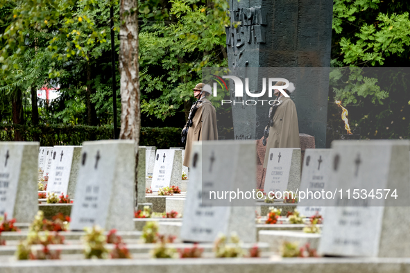 Military servicemen stand by the monument to the unknown soldier during the a ceremony commemorating 85. anniversary of an the outbreak of t...