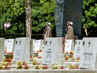 Military servicemen stand by the monument to the unknown soldier during the a ceremony commemorating 85. anniversary of an the outbreak of t...