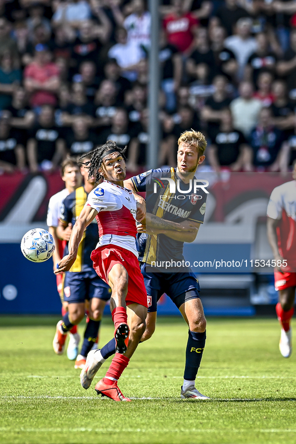 FC Utrecht player Alonzo Engwanda and FC Twente player Michel Vlap during the match Utrecht vs. Twente at Stadium Galgenwaard for the Dutch...