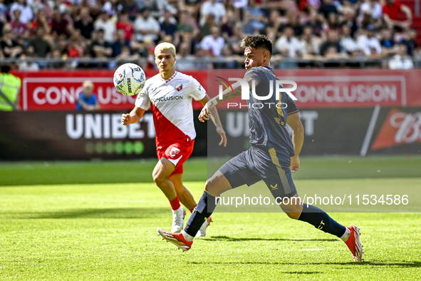 FC Twente player Mees Hilgers during the match Utrecht vs. Twente at Stadium Galgenwaard for the Dutch Eredivisie 4th round season 2024-2025...