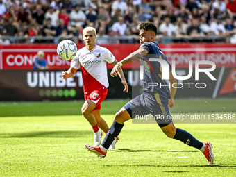 FC Twente player Mees Hilgers during the match Utrecht vs. Twente at Stadium Galgenwaard for the Dutch Eredivisie 4th round season 2024-2025...