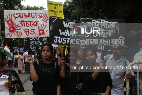 Citizens take part in a protest march in Kolkata, India, on September 1, 2024, against the rape and murder of a PGT doctor. 