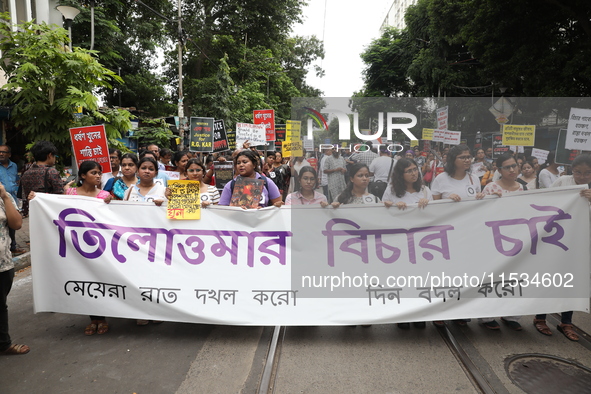 Citizens take part in a protest march in Kolkata, India, on September 1, 2024, against the rape and murder of a PGT doctor. 