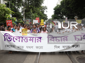 Citizens take part in a protest march in Kolkata, India, on September 1, 2024, against the rape and murder of a PGT doctor. (