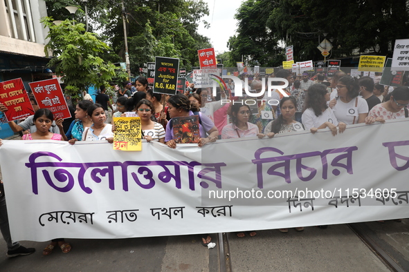 Citizens take part in a protest march in Kolkata, India, on September 1, 2024, against the rape and murder of a PGT doctor. 