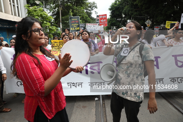 Citizens take part in a protest march in Kolkata, India, on September 1, 2024, against the rape and murder of a PGT doctor. 