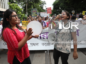 Citizens take part in a protest march in Kolkata, India, on September 1, 2024, against the rape and murder of a PGT doctor. (