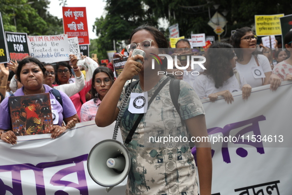 Citizens take part in a protest march in Kolkata, India, on September 1, 2024, against the rape and murder of a PGT doctor. 