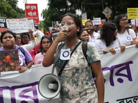 Citizens take part in a protest march in Kolkata, India, on September 1, 2024, against the rape and murder of a PGT doctor. (