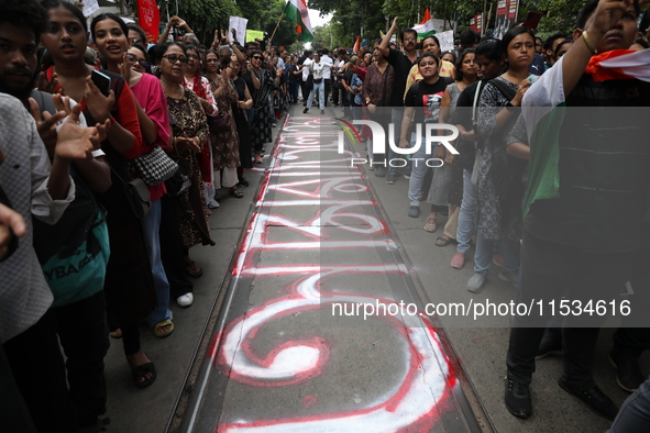 Citizens take part in a protest march in Kolkata, India, on September 1, 2024, against the rape and murder of a PGT doctor. 