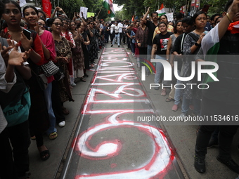 Citizens take part in a protest march in Kolkata, India, on September 1, 2024, against the rape and murder of a PGT doctor. (