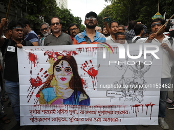 Citizens take part in a protest march in Kolkata, India, on September 1, 2024, against the rape and murder of a PGT doctor. (