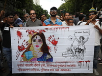 Citizens take part in a protest march in Kolkata, India, on September 1, 2024, against the rape and murder of a PGT doctor. (